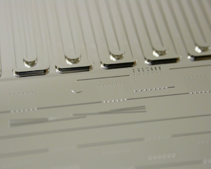 Close-up of pattern-inverted microfluidic-channels in Nickel-insert